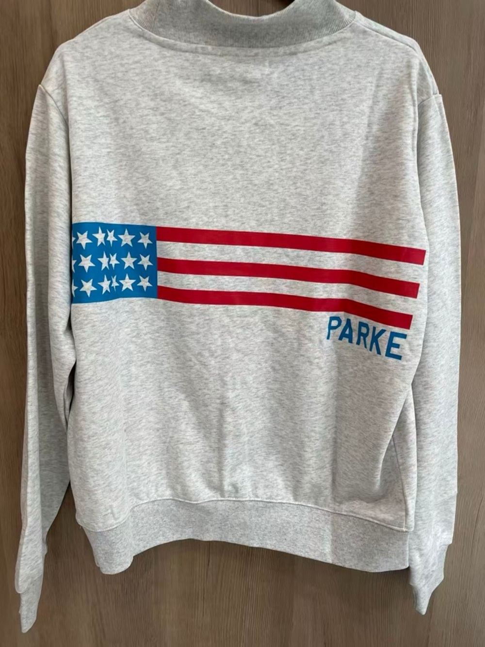 Parke Gray Crewneck Sweater with Red & Blue Flag Graphic